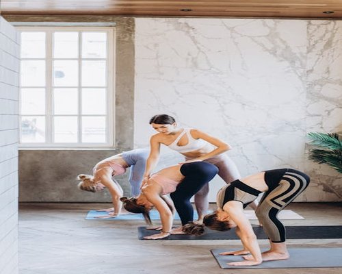 Person balancing on yoga mat
